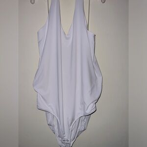 White, halter top Lane Bryant body suit.